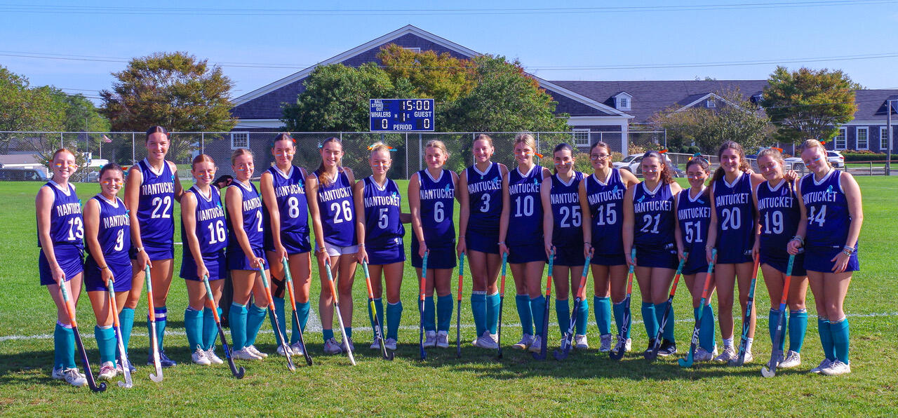 The Nantucket field hockey squad lined up in kit on the pitch