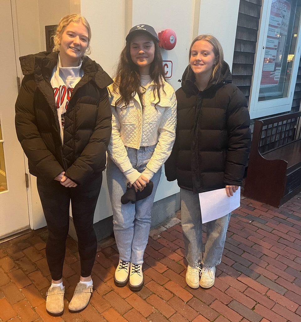 Three Angel Warriors standing together on brick steps